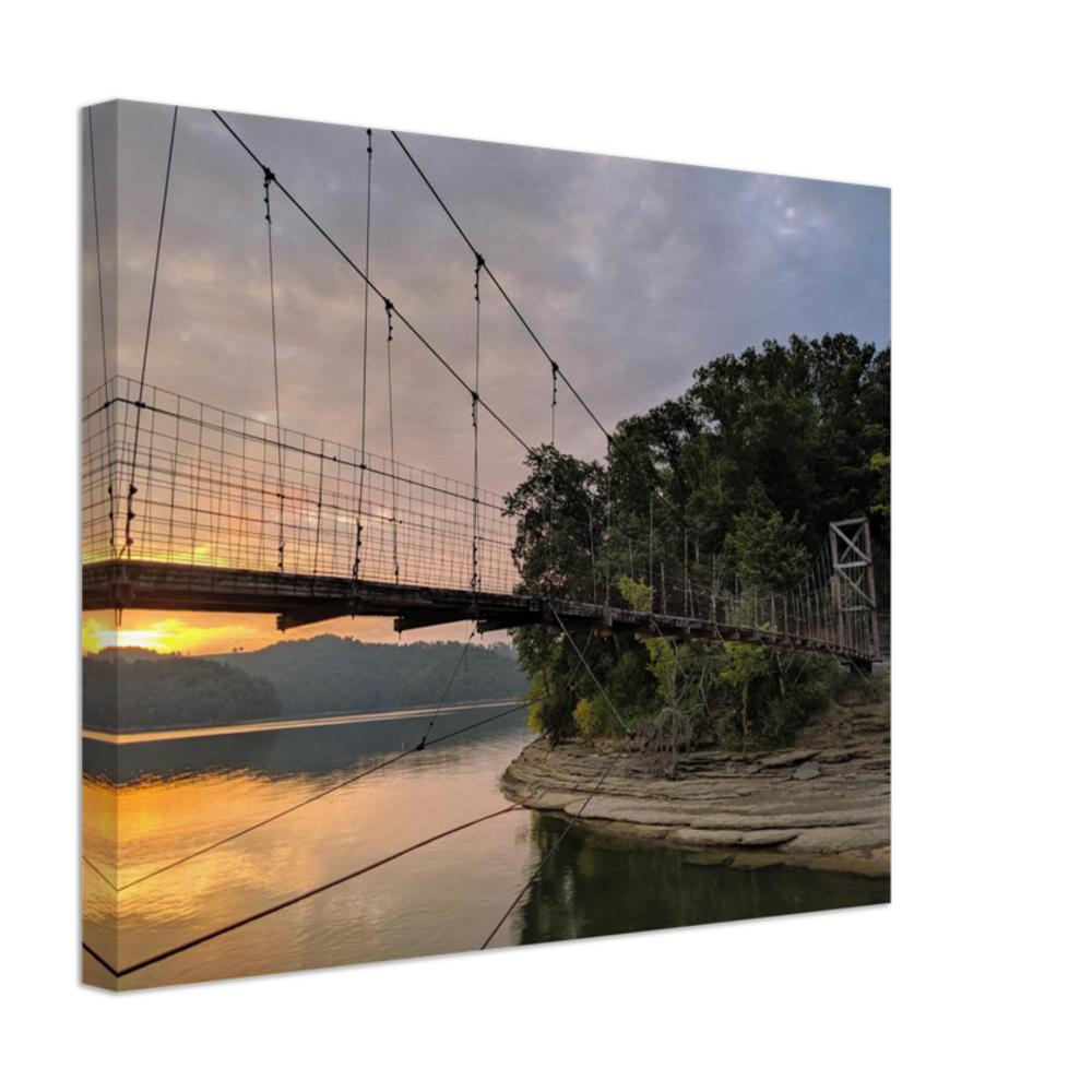 Swinging bridge on Dale Hollow Lake at Pleasant Grove Recreation Area in Celina, Tennessee at sunrise