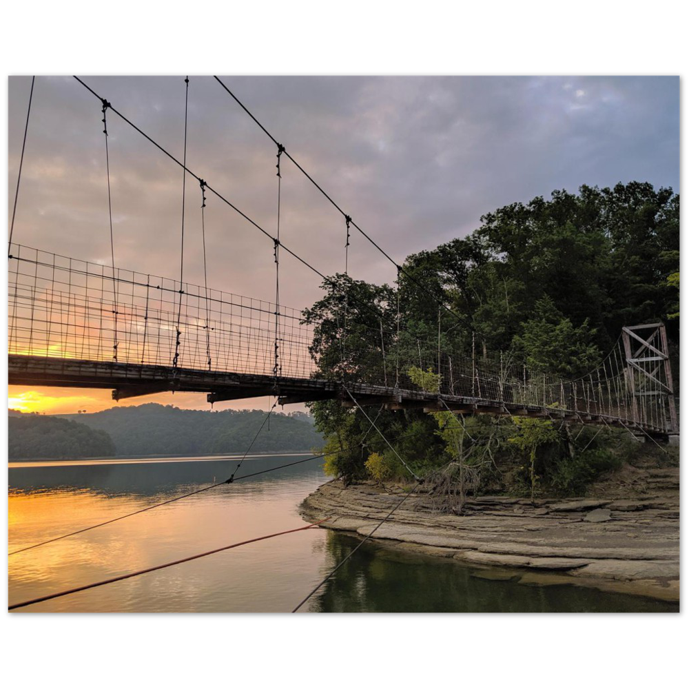 Swinging bridge on Dale Hollow Lake at Pleasant Grove Recreation Area in Celina, Tennessee at sunrise