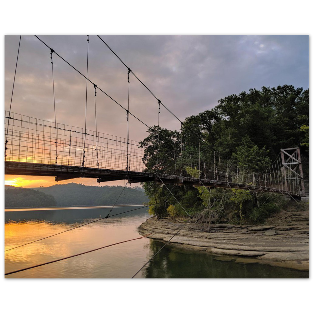 Swinging bridge on Dale Hollow Lake at Pleasant Grove Recreation Area in Celina, Tennessee at sunrise